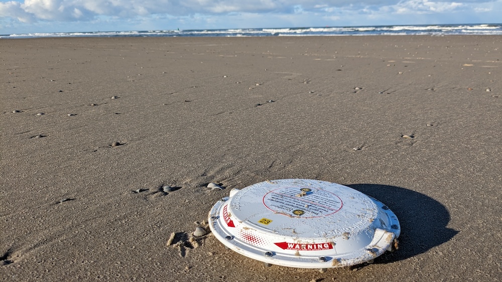 A Stokes drifter on the beach